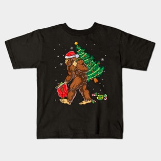 Bigfoot Carrying Christmas Tree Sasquatch Believer Kids T-Shirt